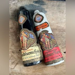 2 vintage stoneware vine bottles